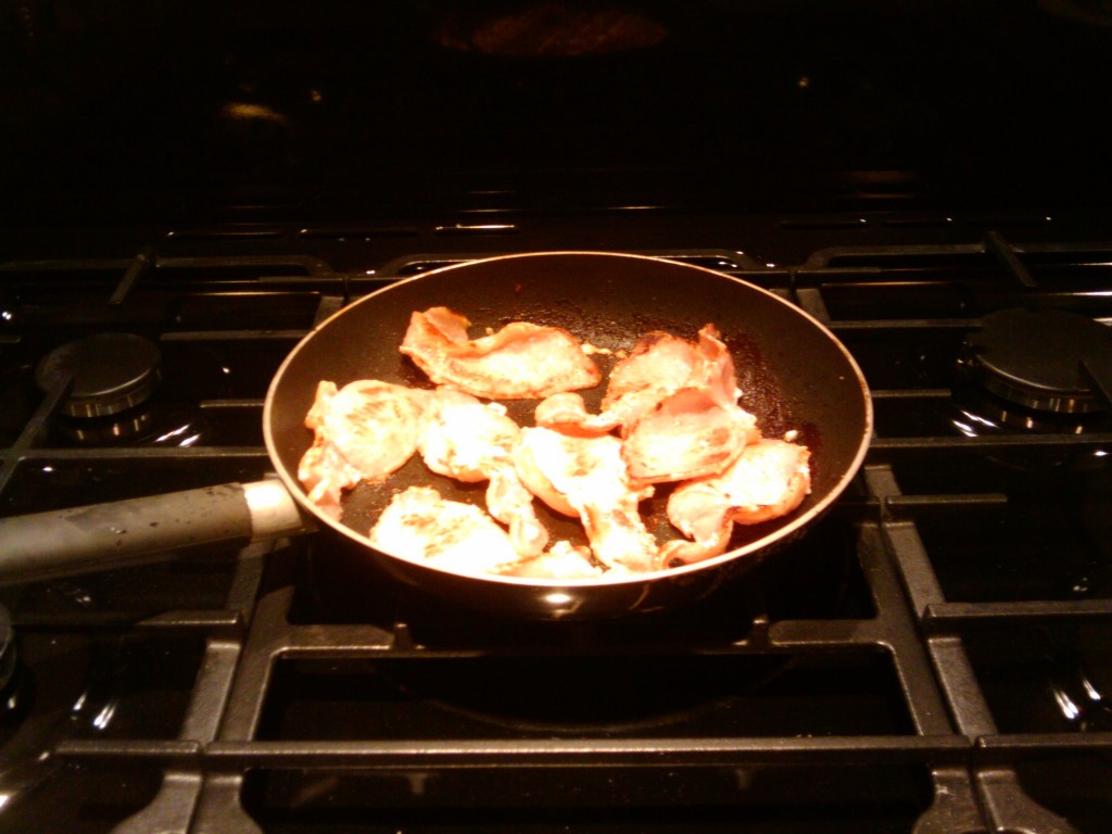 The first fried bacon on the big wok ring