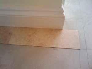 The first Karndean tiles laid on the border