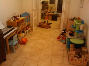 Toys added to library / playroom (right side will have the bookcase)