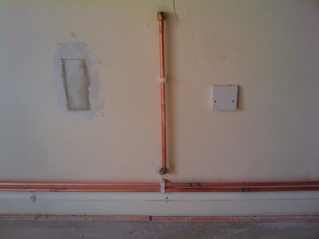 The gas pipe for the hob, coming straight in from the outside