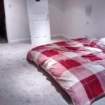 bedroom carpet and mattress